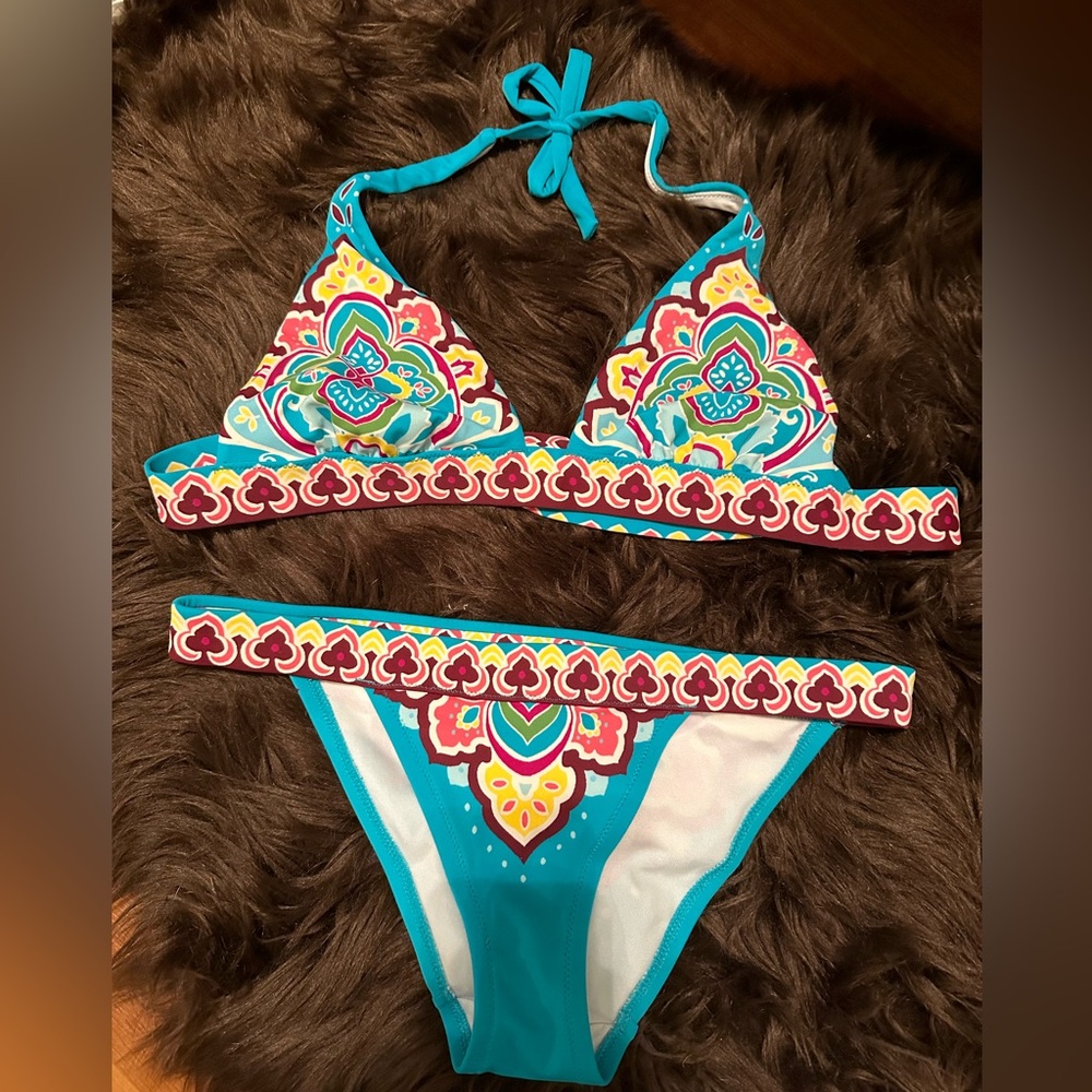 Victoria’s Secret multi color bikini. Top size S. Bottoms size XS.